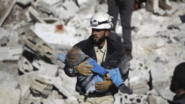 ATTENTION EDITORS - VISUAL COVERAGE OF SCENES OF DEATH AND INJURY A civil defence member carries a dead child in a site hit by what activists said were airstrikes carried out by the Russian air force in the rebel-controlled area of Maaret al-Numan town in Idlib province, Syria January 9, 2016. At least 70 people died in what activists said where four vacuum bombs dropped by the Russian air force in the town of Maaret al-Numan; other air strikes where also carried out in the towns of Saraqib, Khan Sheikhoun and Maar Dabseh, in Idlib. REUTERS/Khalil Ashawi TPX IMAGES OF THE DAY