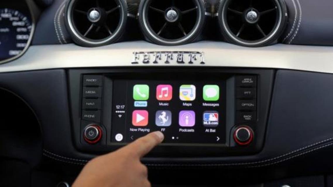 Apple's Stephen Chick displays the CarPlay program at the Worldwide Developers Conference in San Francisco, California June 2, 2014. (Reuters)