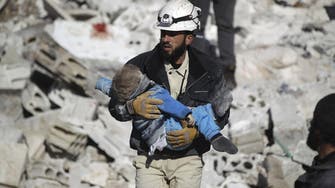 Air strike kills dozens in Syria rebel-held town