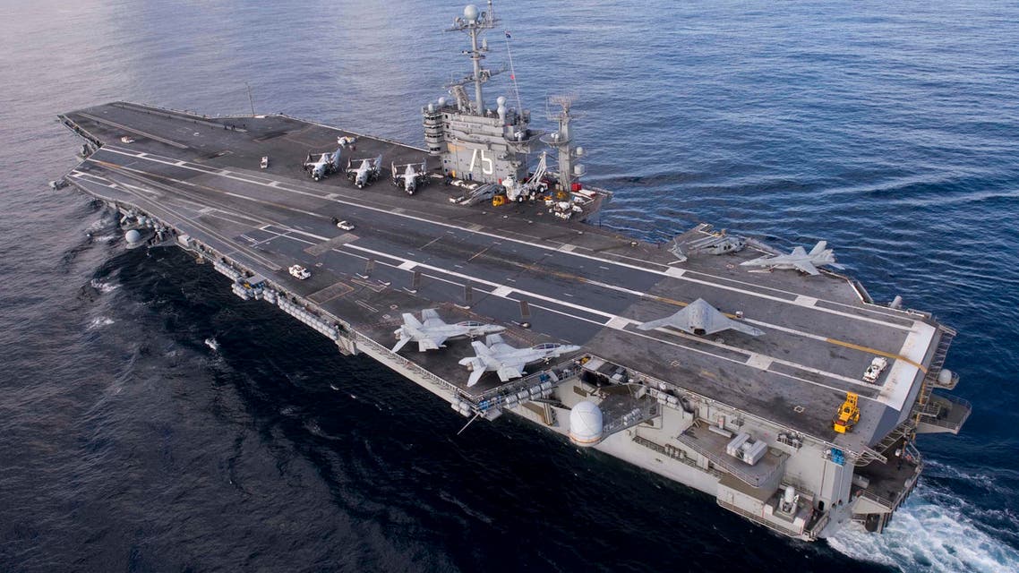 The X-47B Unmanned Combat Air System (UCAS) demonstrator taxies on the flight deck of the aircraft carrier USS Harry S. Truman in the Atlantic Ocean in this December 9, 2012 handout photo. (Reuters)