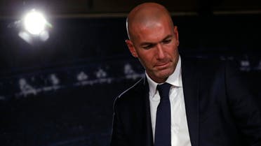 Real Madrid's new coach Zinedine Zidane leaves after a news conference at Santiago Bernabeu stadium in Madrid. (Reuters)