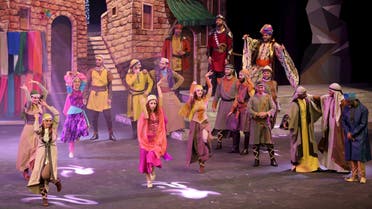 Cast members act in "Al Faris" or "The Knight", a musical set to poetry penned by Dubai's monarch Sheikh Mohammed bin Rashid al-Maktoum, during its premiere in Dubai January 6, 2016. Picture taken January 6, 2016. 