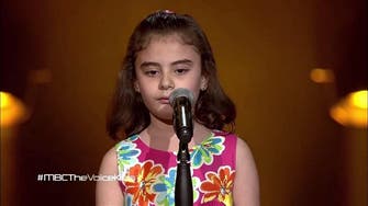 Tearful 'The Voice' performer woos the stars