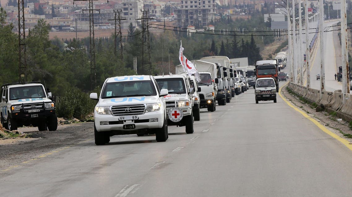 Aid convoys carrying food, medicine and blankets, leave the Syrian capital Damascus as they head to the besieged town of Madaya on January 11, 2015. AFP