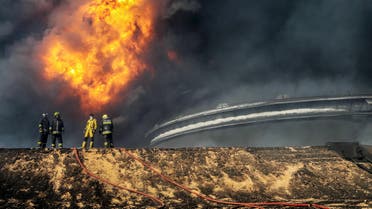 Firefighters try to put out the fire in an oil tank in the port of Es Sider, in Ras Lanuf, Libya, January 6, 2016. (File photo: Reuters)
