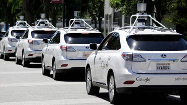 This May 13, 2014 file photo shows a row of Google self-driving Lexus cars at a Google event outside the Computer History Museum in Mountain View, Calif.  (AP)