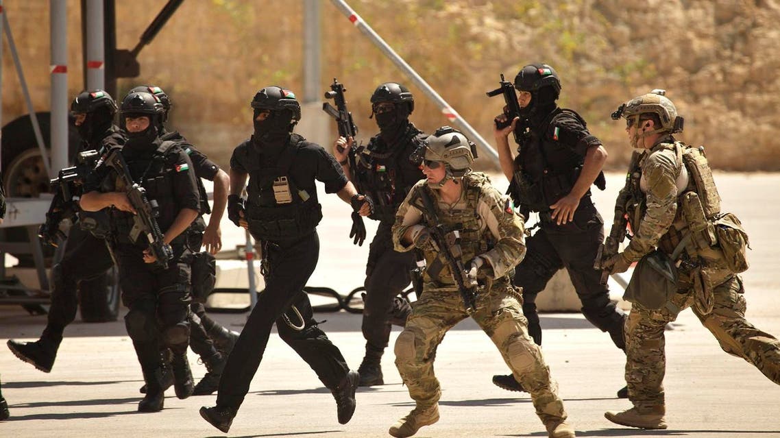 special operations forces from Jordan and the U.S. conduct a combined demonstration with commandos from Iraq, unseen, as part of Eager Lion multinational military maneuvers. (June 20, 2013 File photo: AP)