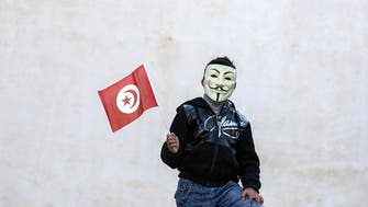 Thousands in Tunis mark revolt anniversary