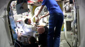 Spacewalk aborted after water leaks into astronaut’s helmet