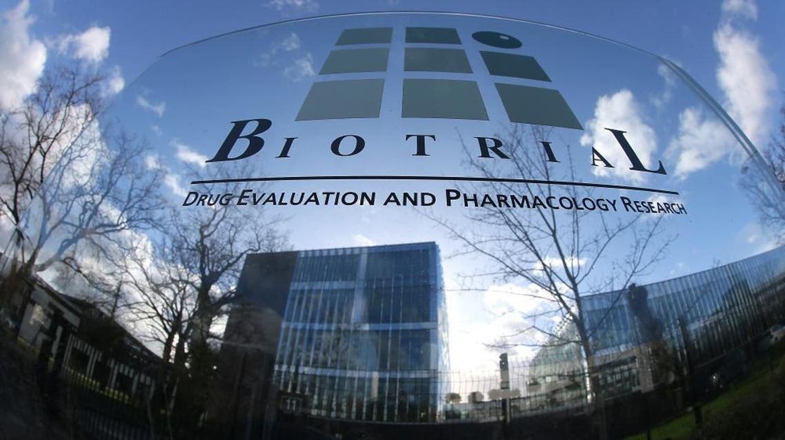 A logo of the Biotrial laboratory is displayed outside its building in Rennes, western France, Friday, Jan. 15, 2016. Officials say six volunteers have fallen ill after participating in a clinical trial in the French city of Rennes and one of them is brain-dead. The French Health Ministry said on Friday that the six were hospitalized after taking a medication that was in the first phase of testing to study safe usage, tolerance and other measures on healthy volunteers. (AP Photo/David Vincent)
