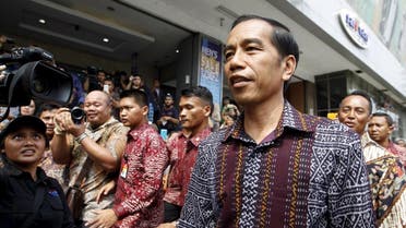 Indonesia's President Joko Widodo visits a department store located near Thursday's gun and bomb attack in central Jakarta January 15, 2016 (Reuters)