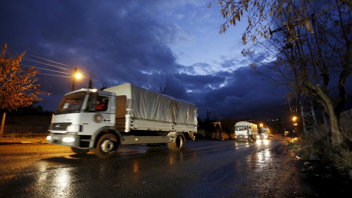 A Red Crescent aid convoy enters Madaya, Syria, January 14, 2016. 