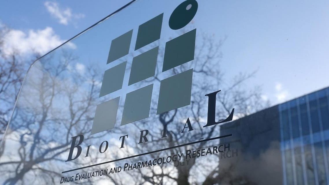 A logo of the Biotrial laboratory is displayed outside its building in Rennes, western France, Friday, Jan. 15, 2016. Officials say six volunteers have fallen ill after participating in a clinical trial in the French city of Rennes and one of them is brain-dead. The French Health Ministry said on Friday that the six were hospitalized after taking a medication that was in the first phase of testing to study safe usage, tolerance and other measures on healthy volunteers. (AP Photo/David Vincent)