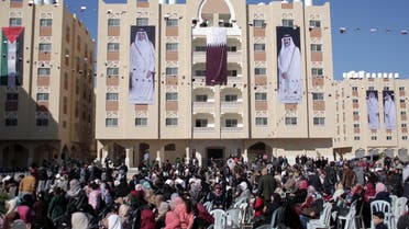 Palestinians gather at the Qatari-funded Hamad City housing complex in Khan Younis, southern Gaza Strip, Saturday, Jan. 16, 2016. AP