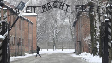 [Window Title] Enter name of file to save to…  [Content] In this Jan. 26, 2015 file picture a person walks near the entrance to the former Nazi Death Camp complex of Auschwitz with the "Arbeit Macht Frei" (Work Sets you Free) (AP) The file name is not valid.  [OK]