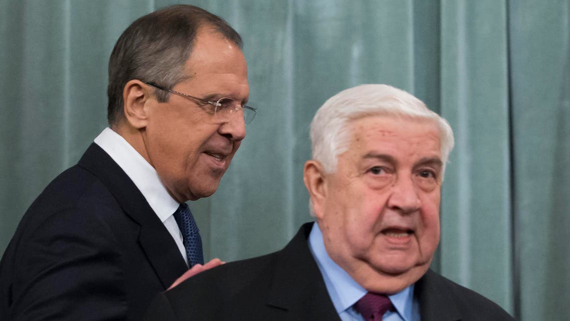 Russian Foreign Minister Sergey Lavrov, left, and Syria's Foreign Minister Walid al-Moallem enter a hall for their news conference following their talks in Moscow, Russia, Friday, Nov. 27, 2015. The presidents of France and Russia agreed Thursday, Nov. 26, 2015 to tighten cooperation in the fight against the Islamic State group, although they remained at odds over their approach toward Syrian President Bashar Assad. (AP Photo/Ivan Sekretarev)