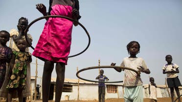    Juba : Children play with hula hoops at the Children Friendly Space, run by UNICEF at the United Nations Missions In South Sudan (UNMISS) Protection of Civillians (PoC) site in Juba, South Sudan, on January 15, 2016. According to UNICEF South Sudan has the highest proportion of out of school children in the world, with more than half (51%) of primary and lower secondary age children do not have access to an education. Even before the 2013 conflict, only one in ten children in South Sudan completed primary school. The country had 1.4 million children out of school. The ensuing two years of violence exacerbat the situation forcing 413,000 more children to drop out of school, leading to the destruction of more than 800 schools. / AFP / Albert Gonzalez Farran