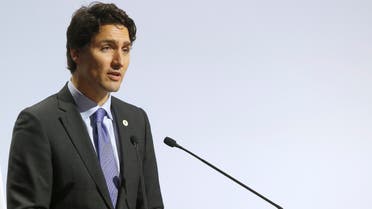 Canadian Prime Minister Justin Trudeau addresses world leaders at the COP21, United Nations Climate Change Conference, in Le Bourget, outside Paris, Monday, Nov. 30, 2015. (AP)
