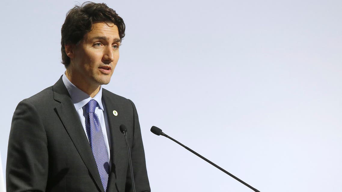 Canadian Prime Minister Justin Trudeau addresses world leaders at the COP21, United Nations Climate Change Conference, in Le Bourget, outside Paris, Monday, Nov. 30, 2015. (AP)