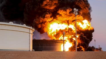 Fire rises from an oil tank in the port of Es Sider, in Ras Lanuf, Libya, January 4, 2016.  (Reuters)
