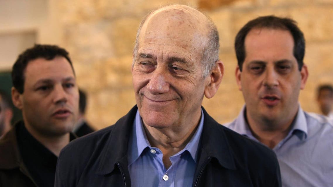 Olmert had been sentenced in May 2014 to six years in prison on two separate charges of taking bribes in the early 2000s. (AP)