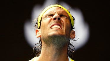 Spain's Nadal reacts during his first round match against Spain's Verdasco at the Australian Open tennis tournament at Melbourne Park, Australia. (Reuters)