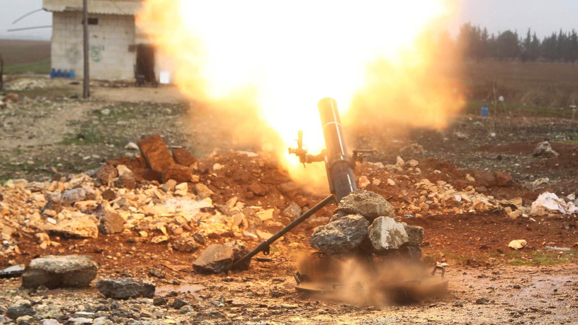 Free Syrian Army fighter fires a shell towards ISIS fighters in the northern Aleppo countryside, Syria, January 18, 2016. (Reuters)