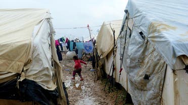 A handout picture released by Amnesty International on January 19, 2016 shows internally displaced Arab Iraqis at a camp in Khanaqin in Iraq's northeastern Diyala province. (AFP)