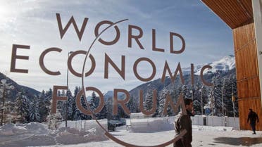 A man walks at the main entrance of the congress center where the World Economic Forum will take place later this week in Davos, Switzerland, Monday Jan. 18, 2016. The world's political and business elite are being urged to do more than pay lip service to growing inequalities around the world as they head off for this week's World Economic Forum in the Swiss ski resort of Davos.iss Alpine town of Davos this week. (AP Photo/Michel Euler)