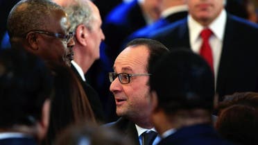 French President Francois Hollande shakes hand with foreign ambassadors during a ceremony to extend New Year wishes at the Elysee Palace, in Paris, Thursday, Jan. 21, 2016. (AP Photo/Thibault Camus/Pool)