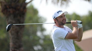 Andy Sullivan of England watches the ball after the tee off at the 18th hole during the second round of the Abu Dhabi HSBC Golf Championship in Abu Dhabi. (File photo: The Associated Press)