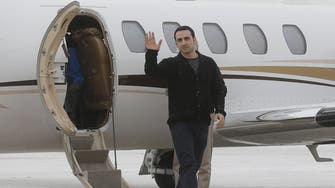Two Americans held in Iran arrive home after prisoner swap
