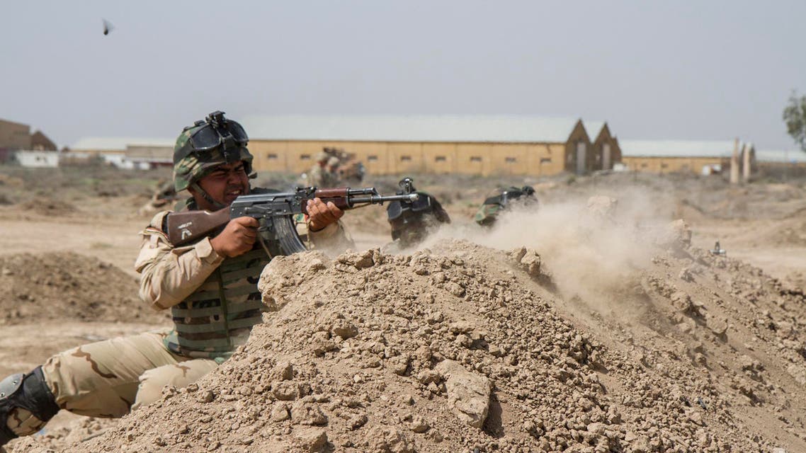 Iraqi soldiers train with members of the U.S. Army 3rd Brigade Combat Team, 82nd Airborne Division, at Camp Taji, Iraq, in this U.S. Army photo released June 2, 2015. (Reuters)