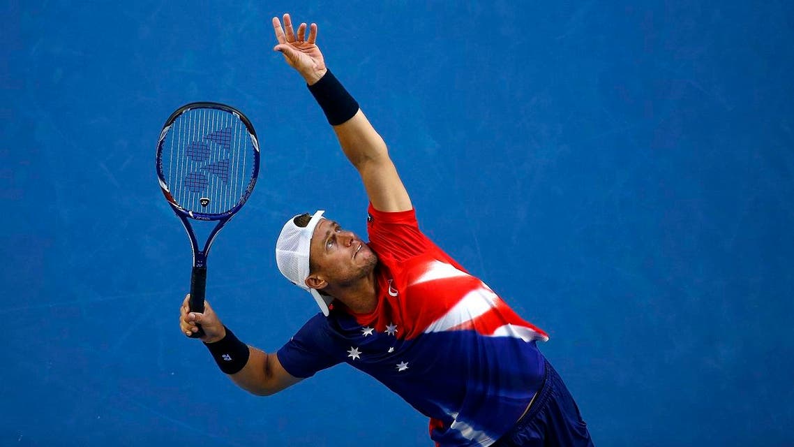 Australia's Hewitt serves during his second round match against Spain's Ferrer at the Australian Open tennis tournament at Melbourne Park. (Reuters)