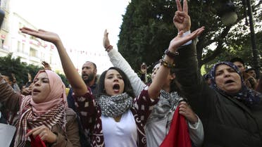 Unemployed graduates shout slogans during a demonstration to demand the government provide them with job opportunities, on Habib Bourguiba Avenue in Tunis, Tunisia January 20, 2016. reuters