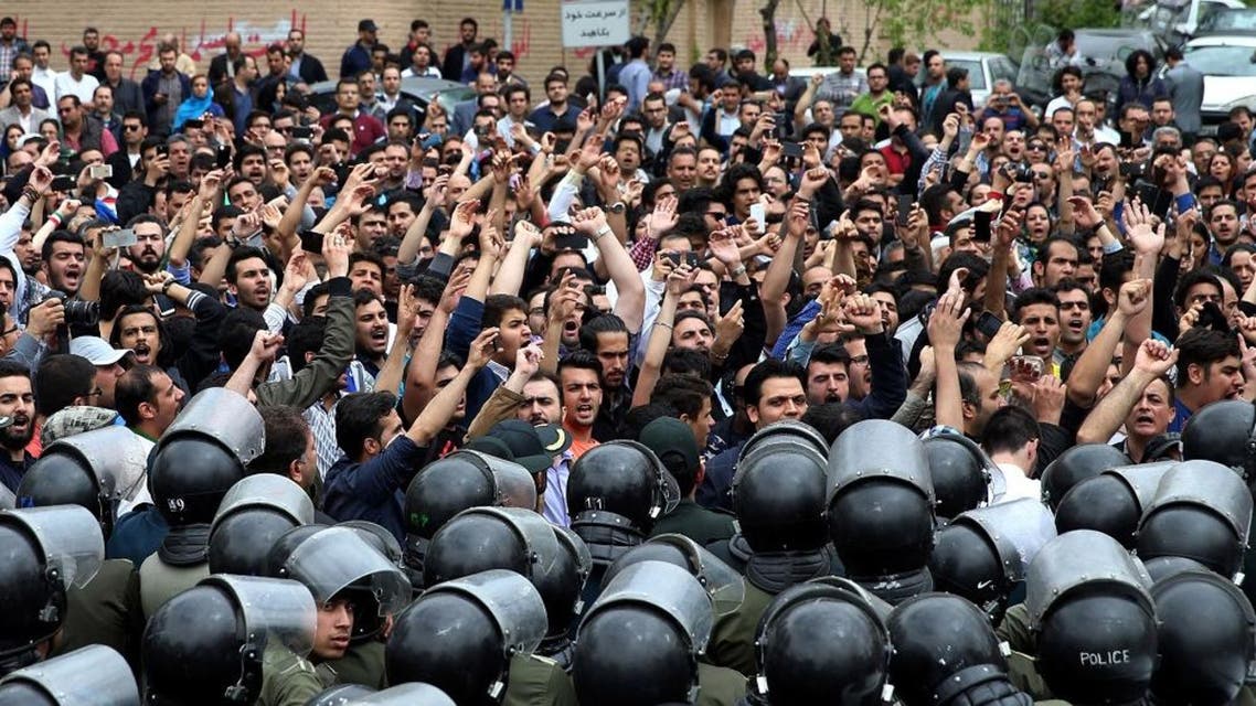 In this Saturday, April 11, 2015 file photo, a group of Iranian protesters chant slogans in front of the Saudi Embassy in Tehran, Iran. Defying a government ban, hundreds of Iranians protested over two male Iranian pilgrims who alleged abuse after Saudi officers at Jeddah's international airport searched them. Demonstrators shouted: "Shame on you!" and "Death to House of Saud!" in reference to the Saudi ruling family. Details of the abuse have not been made public though Iran formally has called for the Saudi officers to be punished. (AP Photo/Ebrahim Noroozi, File)