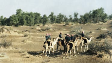  Trucial Oman scouts patrol in the desert on the backs of camels in one of their visits to outlying areas of Abu Dhabi in 1971. (AP Photo)