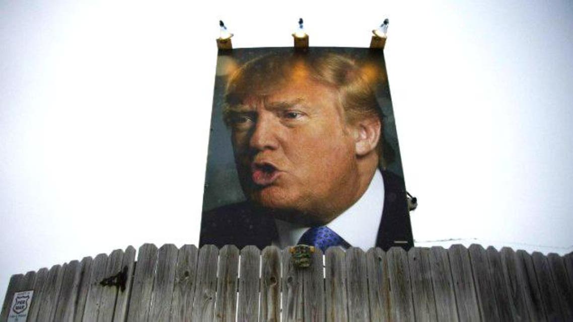 It shows Trump with his mouth open in a rictus and his eyes hard and focused. (AFP)