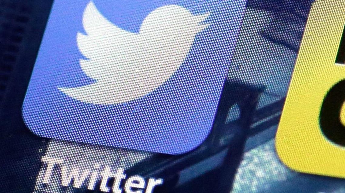 This Friday, Oct. 18, 2013, file photo, shows a Twitter app on an iPhone screen, in New York. Twitter says that four executives are leaving the company. Twitter CEO Jack Dorsey posted Monday, Jan. 25, 2016, that Alex Roetter, Skip Schipper, Katie Stanton and Kevin Weil are exiting the company. Roetter served as senior vice president of engineering, Schipper was vice president of human resources, Stanton was vice president of social media and Weil was senior vice president of product. (AP Photo/Richard Drew, File)