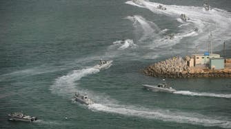 Iran warned U.S. warship to leave drill area 