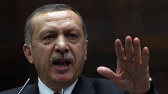 Turkey prosecutors seek life terms for two anti-Erdogan journalists 