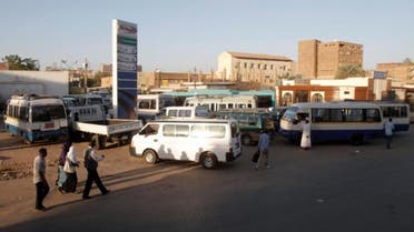 Drivers queue up in their vans for fuel at a gas station in the Sudanese capital Khartoum. (AFP)