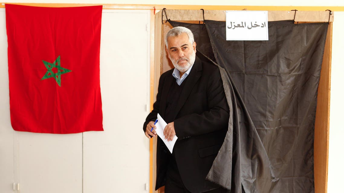 Abdelilah Benkirane, the secretary general of Morocco's Islamist Justice and Development Party leaves the voting booth in Rabat, Morocco, Friday, Nov. 25, 2011. Moroccans began voting for a new parliament Friday in Arab Spring-inspired elections that are facing a boycott by democracy campaigners who say the ruling monarchy isn't committed to real change. (AP Photo/Abdeljalil Bounhar)
