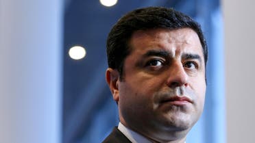 Selahattin Demirtas, co-leader of the pro-Kurdish Peoples' Democratic Party (HDP) is seen during an interview with Reuters at the European Parliament in Brussels, Belgium, January 27, 2016. "The international community should call on both the Turkish government and the PKK for a ceasefire and a return to healthy negotiations, and they must make this call repeatedly," Selahattin Demirtas, co-leader of the pro-Kurdish Peoples' Democratic Party (HDP), the third largest party in the Turkish parliament, told Reuters. "Turkey's domestic peace is not an issue for Turkey alone. It is directly related to the resolution of the Syrian conflict and to the migration problem in Europe," he said in an interview on Wednesday in Brussels, where he was participating in a Kurdish conference in the European parliament. REUTERS/Yves Herman