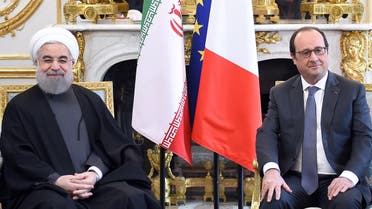French president Francois Hollande, right, speaks with Iranian President Hassan Rouhani during a meeting at the Elysee Palace, in Paris, Thursday, Jan. 28, 2016.  (AP)