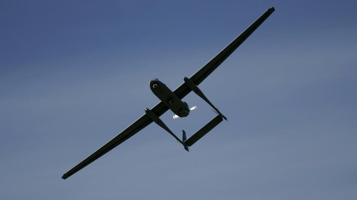 In this March 7, 2007 file photo The Israeli army's Heron unmanned drone aircraft for surveillance missions flies during a display at the Palmahim Air Force Base, Israel. AP