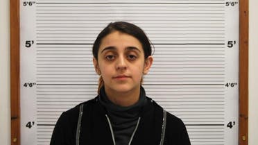 An undated handout photo released by West Midlands Police service and received in London on January 29, 2016, shows Tareena Shakil as she poses for a custody photograph without a head scarf. A mother who took her toddler to Syria and joined the Islamic State (IS) group is thought to have become the first British woman to be convicted after returning home. Tareena Shakil, 26, was found guilty of IS membership and encouraging terrorism in posts on Twitter before leaving Britain.