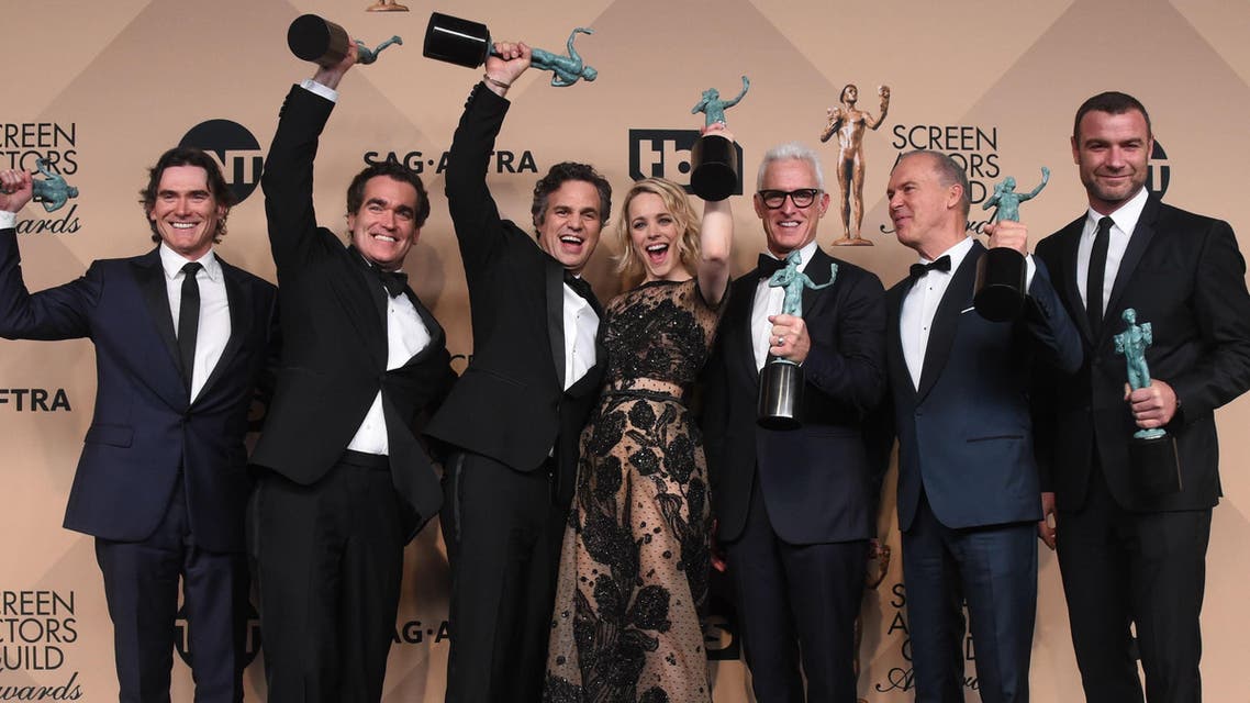The cast of "Spotlight" poses in the press room with the Actor for Outstanding Performance by a Cast in a Motion Picture at the 22nd Annual Screen Actors Guild Awards at The Shrine Auditorium on January 30, 2016 in Los Angeles, California. AFP