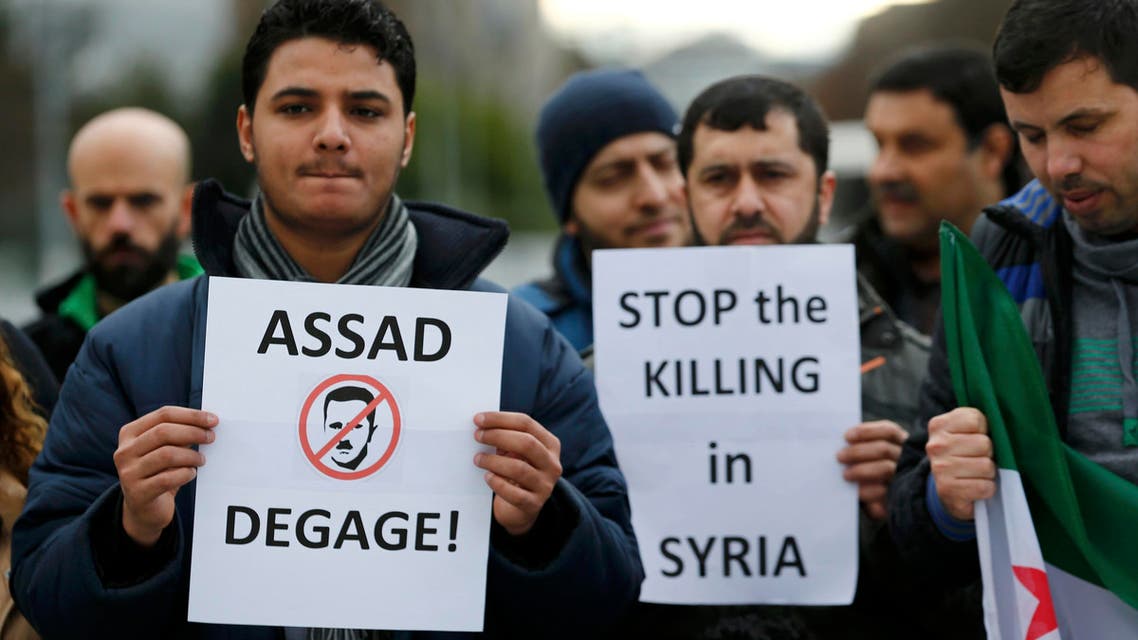 People demonstrate against the Syrian regime ahead of the start of the Syrian Peace talks outside the U.N. European headquarters in Geneva, Switzerland, January 29, 2016. REUTERS