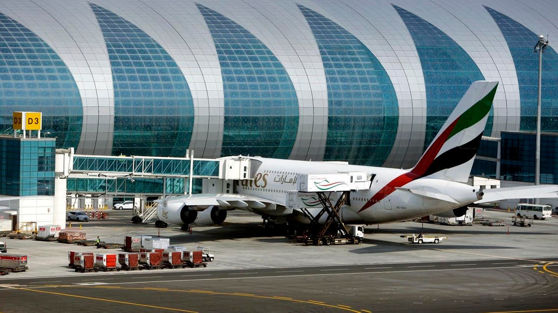 An Emirates plane is parked at the new Concourse A of Dubai airport in Dubai, United Arab Emirates, Sunday, Feb. 10, 2013. (AP)